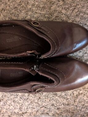 Clarks Woman's Dark Brown Slip-On Leather Boots with Buckle Accent